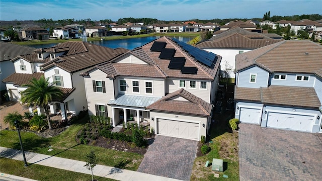 drone / aerial view with a water view