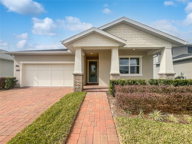 view of front of property with a garage