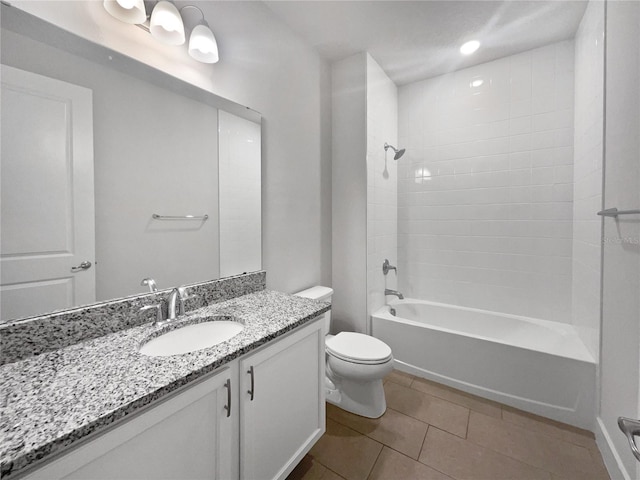 full bathroom with shower / bathing tub combination, vanity, tile patterned floors, and toilet