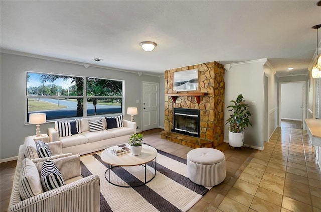 tiled living room featuring crown molding and a stone fireplace