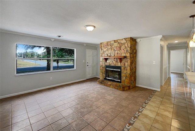 unfurnished living room with crown molding, light tile patterned floors, and a stone fireplace