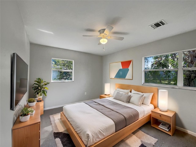 bedroom featuring ceiling fan and carpet flooring