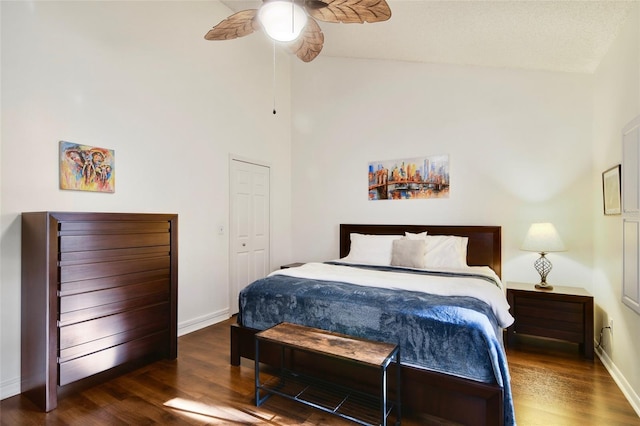 bedroom featuring dark hardwood / wood-style floors and ceiling fan