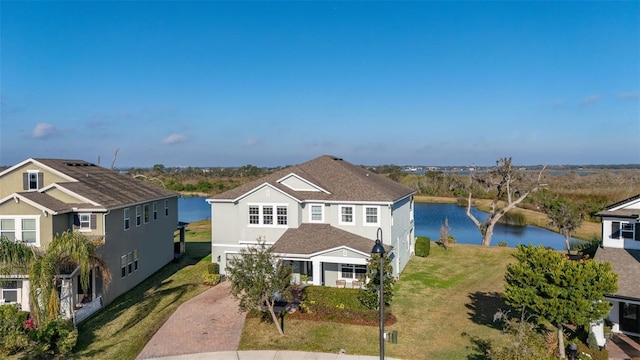 view of front of home featuring a water view