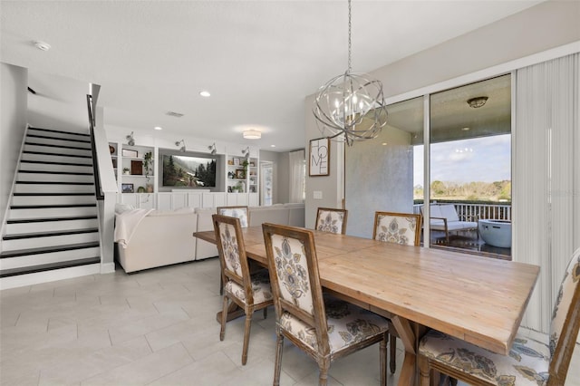 dining room with a chandelier