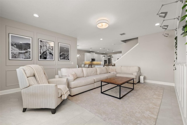 living room featuring light tile patterned flooring