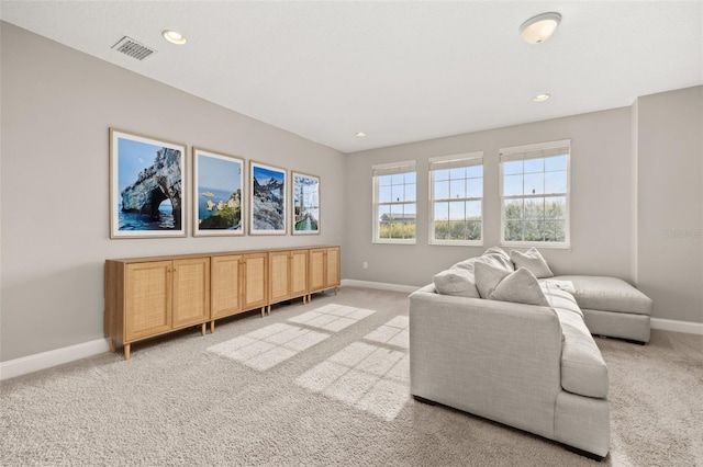 living room with light colored carpet