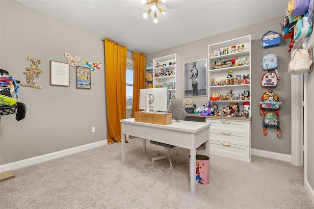 carpeted office with a textured ceiling