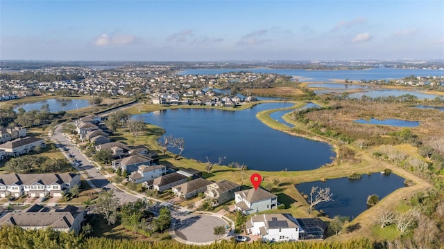 drone / aerial view featuring a water view