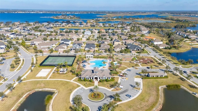 birds eye view of property featuring a water view