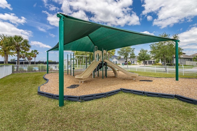 view of jungle gym featuring a yard