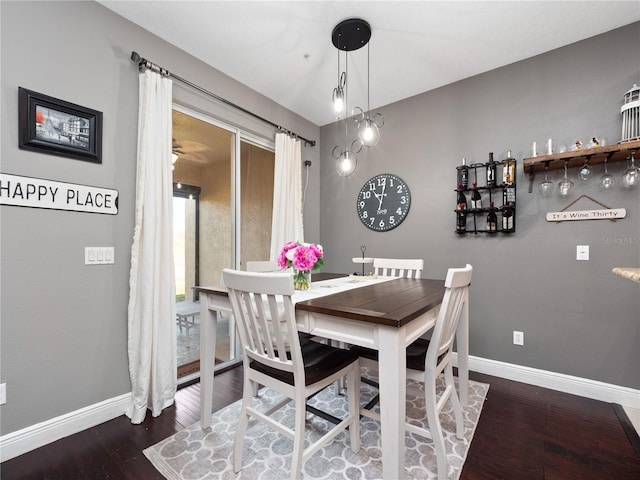 dining area featuring dark hardwood / wood-style floors