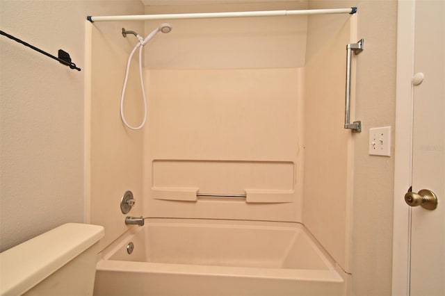 bathroom with shower / bathtub combination and toilet