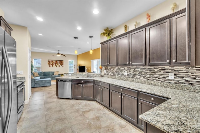 kitchen with pendant lighting, dark brown cabinetry, appliances with stainless steel finishes, and plenty of natural light