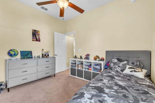 carpeted bedroom with ceiling fan