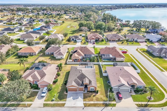 drone / aerial view with a water view