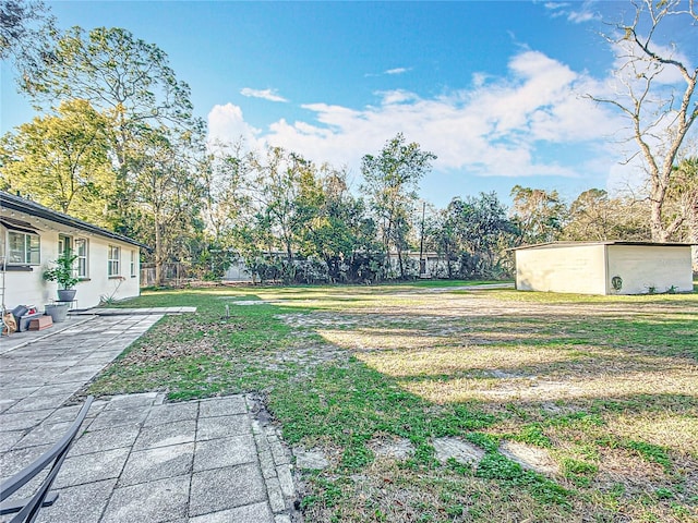 view of yard with a patio area and fence