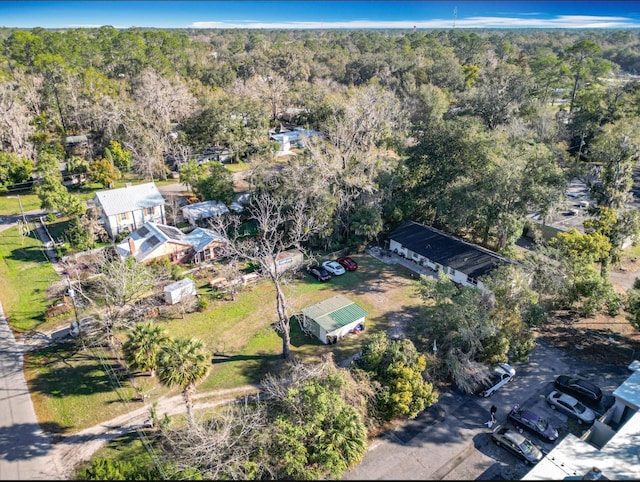 drone / aerial view with a view of trees