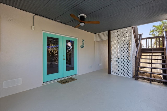 exterior space with a patio, ceiling fan, and french doors