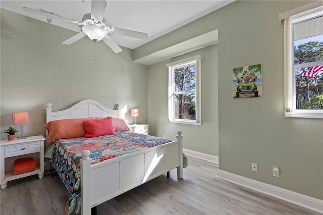 bedroom featuring ceiling fan and light wood-type flooring