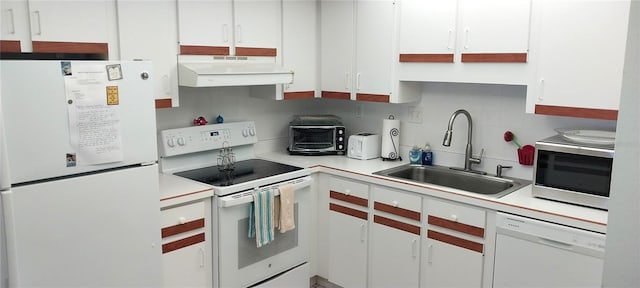 kitchen with white cabinetry, white appliances, sink, and decorative backsplash