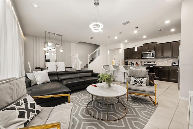 living room featuring light tile patterned floors