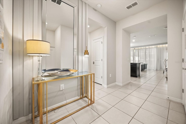 hallway featuring tile patterned floors