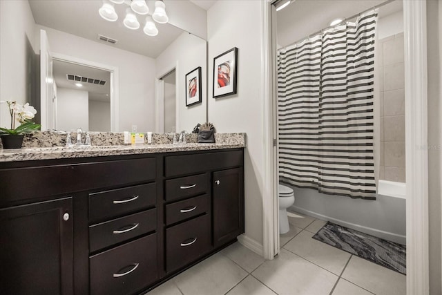 full bathroom with shower / tub combo with curtain, vanity, tile patterned floors, and toilet