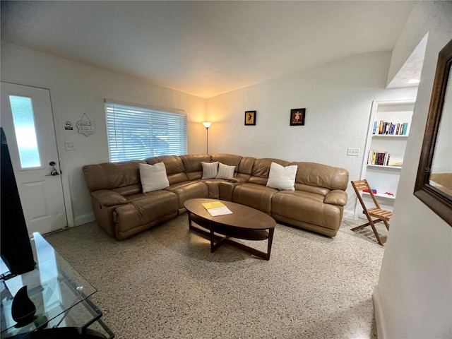 living room with vaulted ceiling