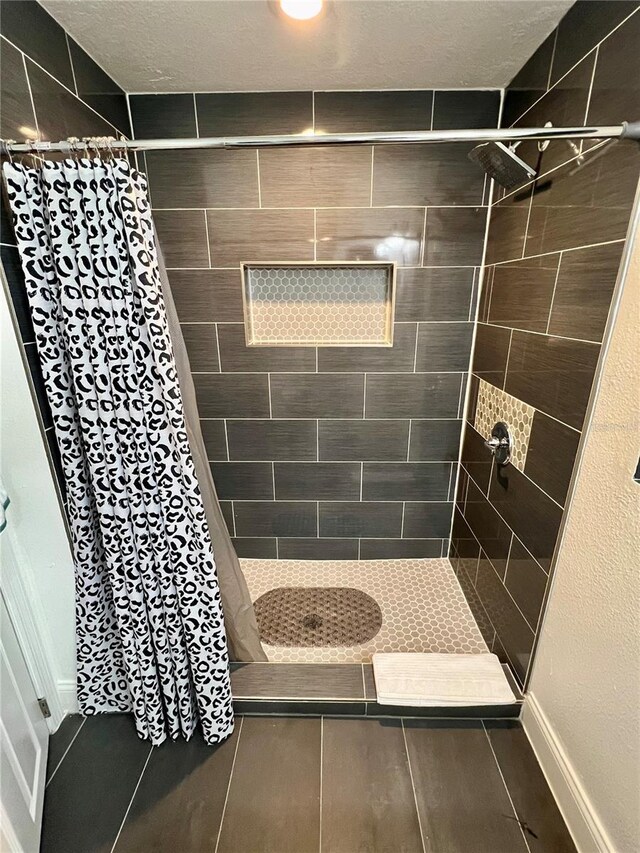 bathroom with curtained shower