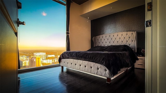 bedroom featuring hardwood / wood-style floors