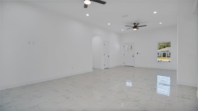 empty room featuring ceiling fan