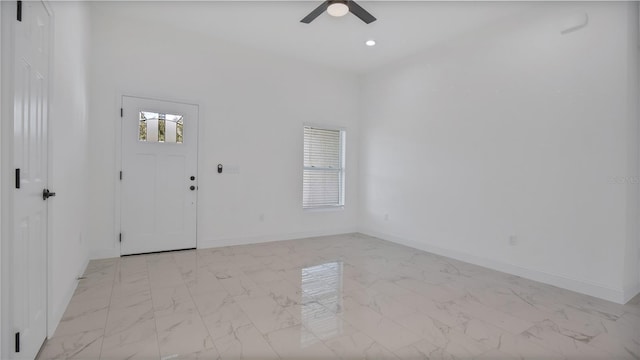 entryway featuring ceiling fan