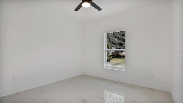 unfurnished room with ceiling fan