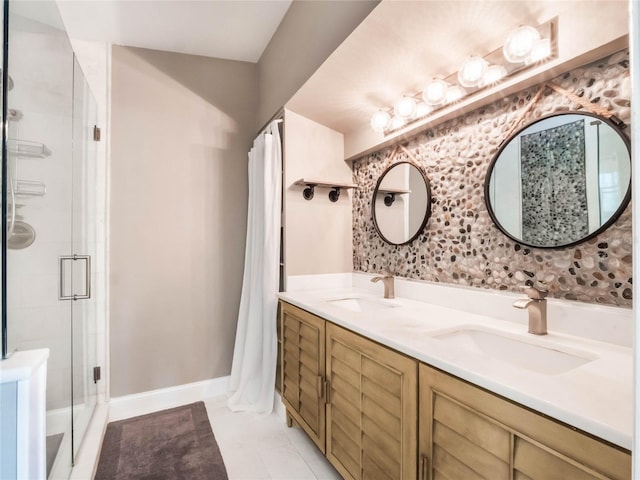 bathroom with vanity and a shower with shower door