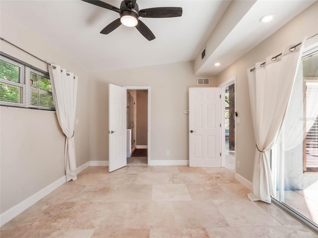 unfurnished bedroom featuring ceiling fan