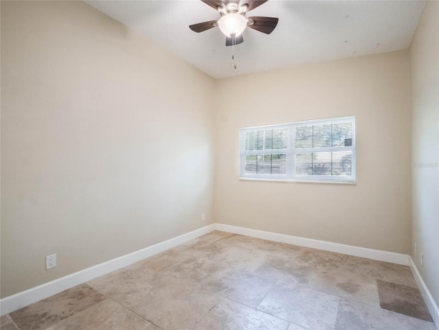 spare room featuring ceiling fan