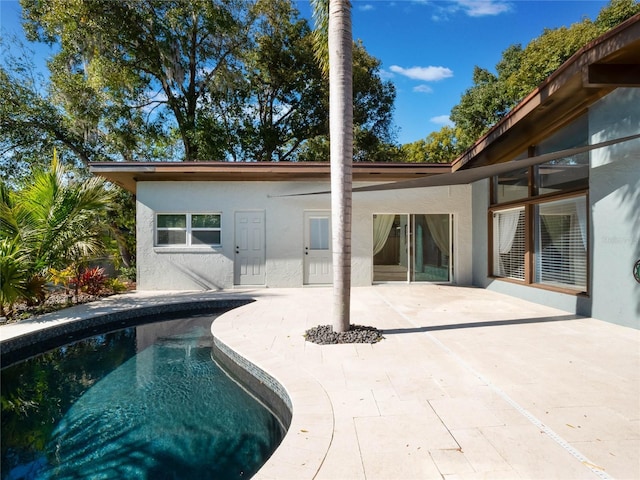 rear view of property with a patio area