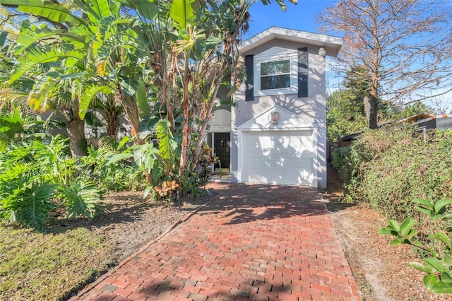 view of front of property with a garage