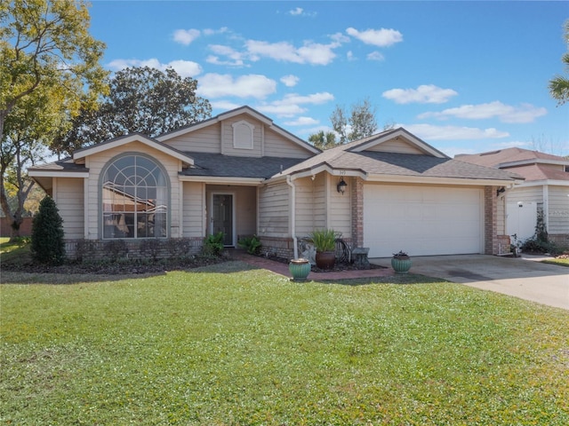 single story home featuring a front yard and a garage