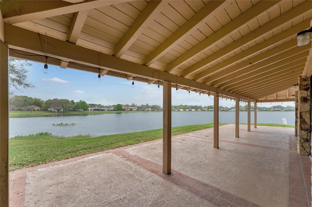 view of patio / terrace with a water view