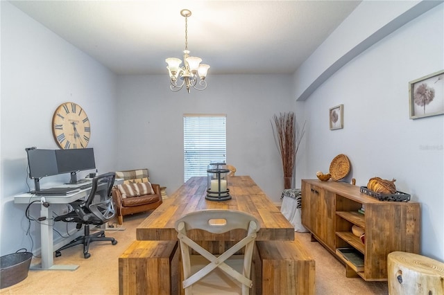 dining room featuring light carpet and a notable chandelier