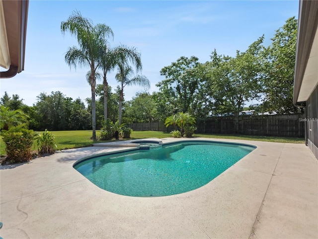 view of pool featuring an in ground hot tub and a patio area