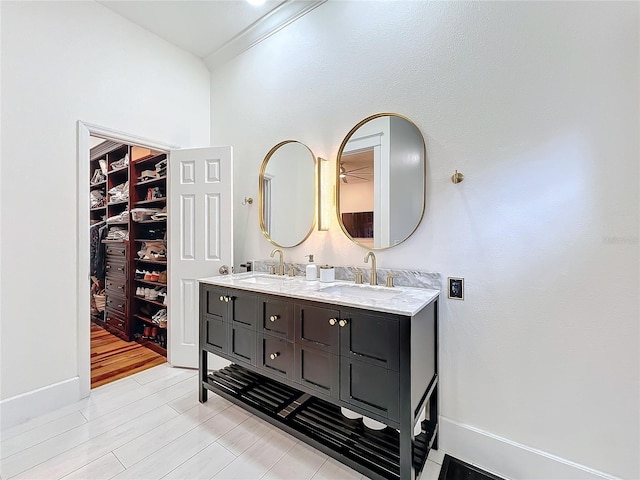 bathroom featuring vanity and hardwood / wood-style floors