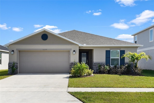 ranch-style house featuring a garage and a front lawn