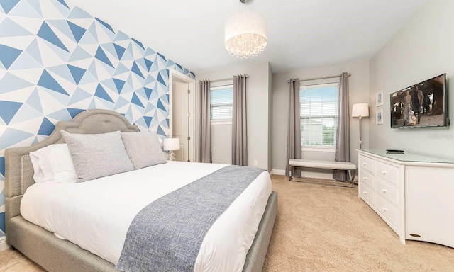 bedroom featuring light colored carpet