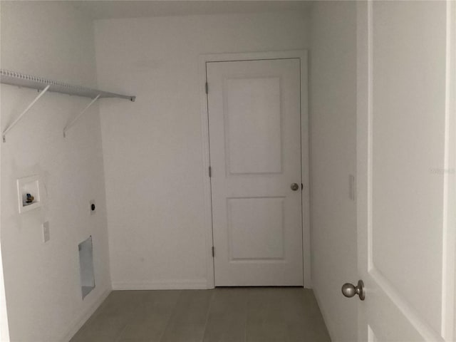 laundry room featuring hookup for a washing machine, laundry area, hookup for an electric dryer, and tile patterned floors