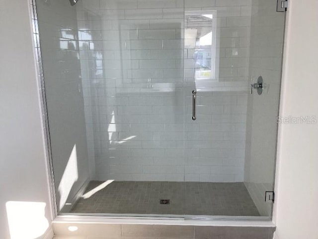 bathroom with a stall shower