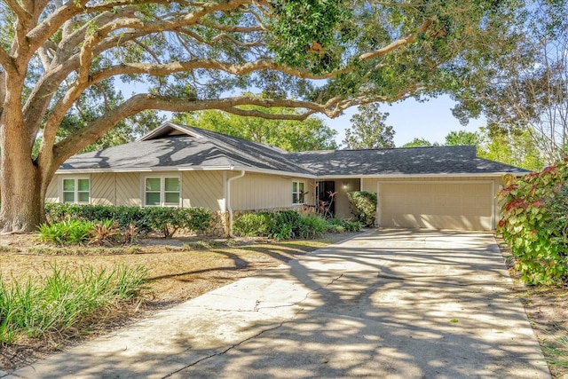 single story home with a garage