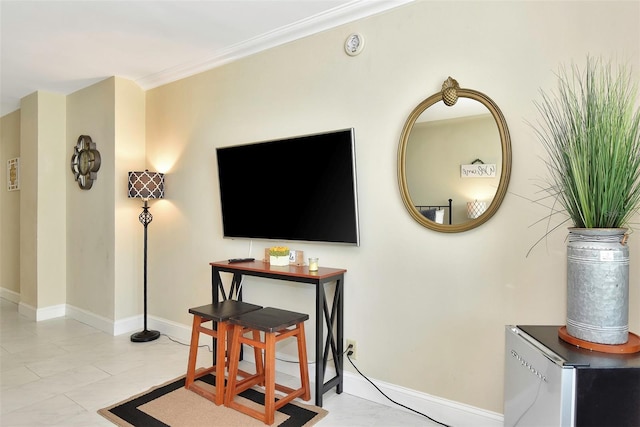 living room with ornamental molding